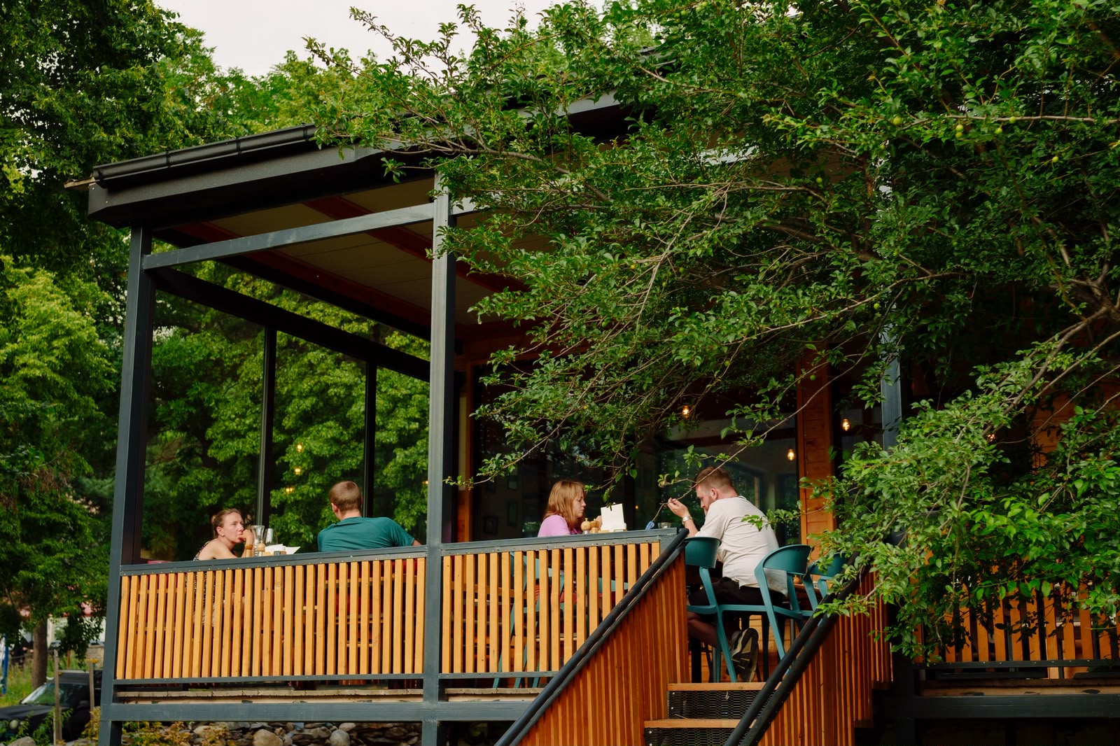 Guests dining on Samani's garden terrace