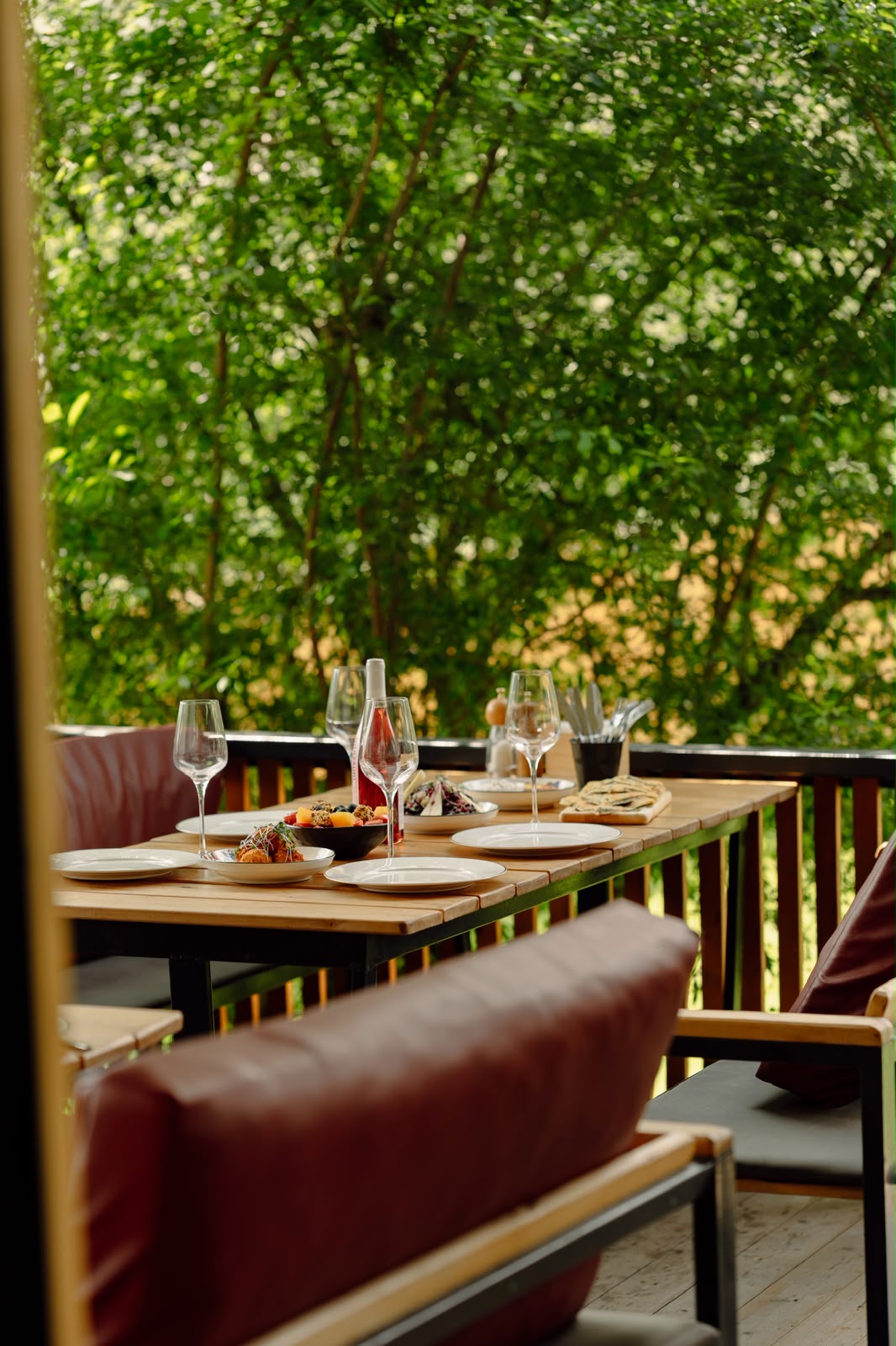 A table set on Samani's leafy terrace